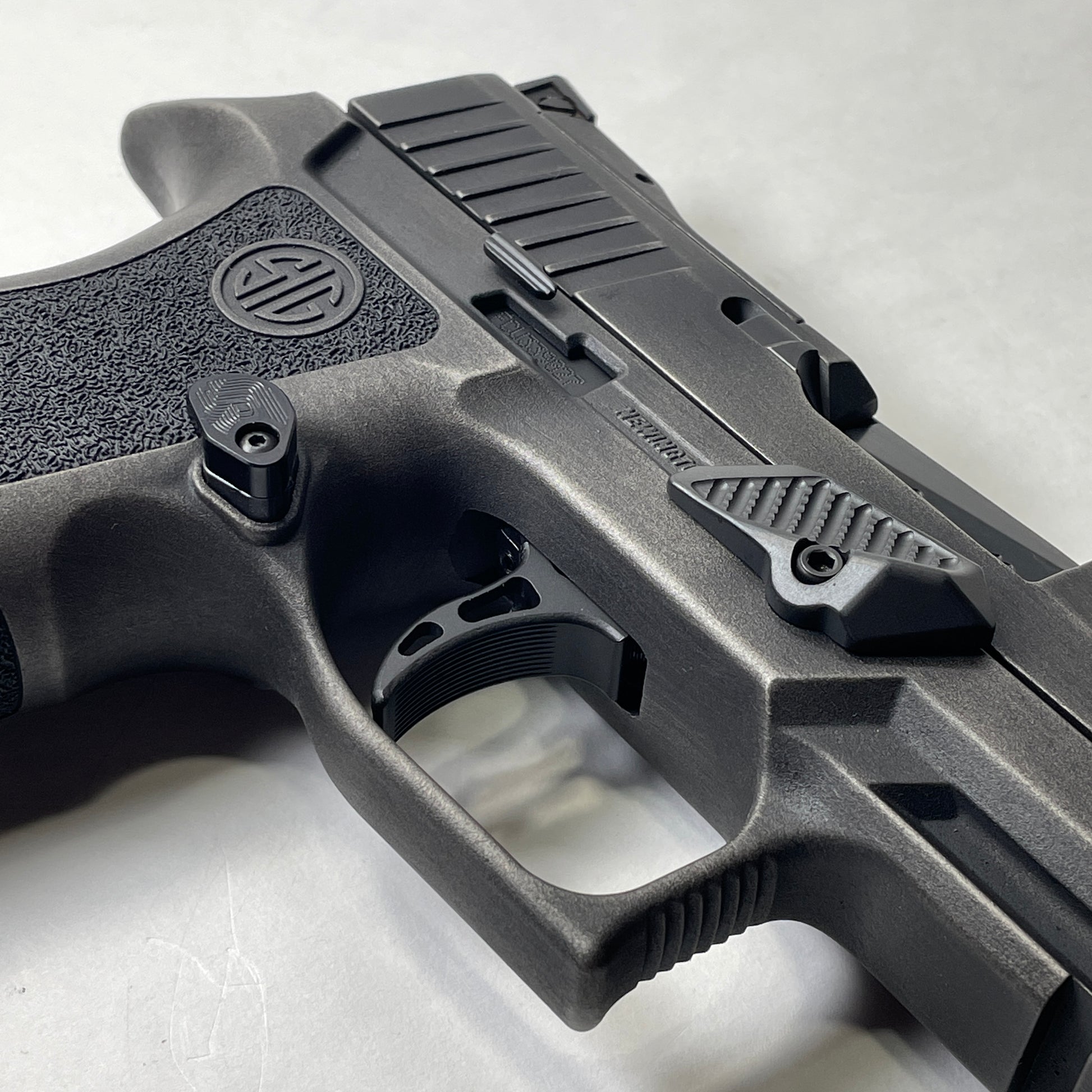 Springer Precision P320 Extended Magazine Release Paddle image 2