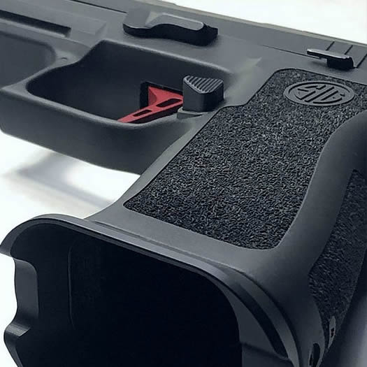 Armory Craft P320 Extended Magazine Release image 1